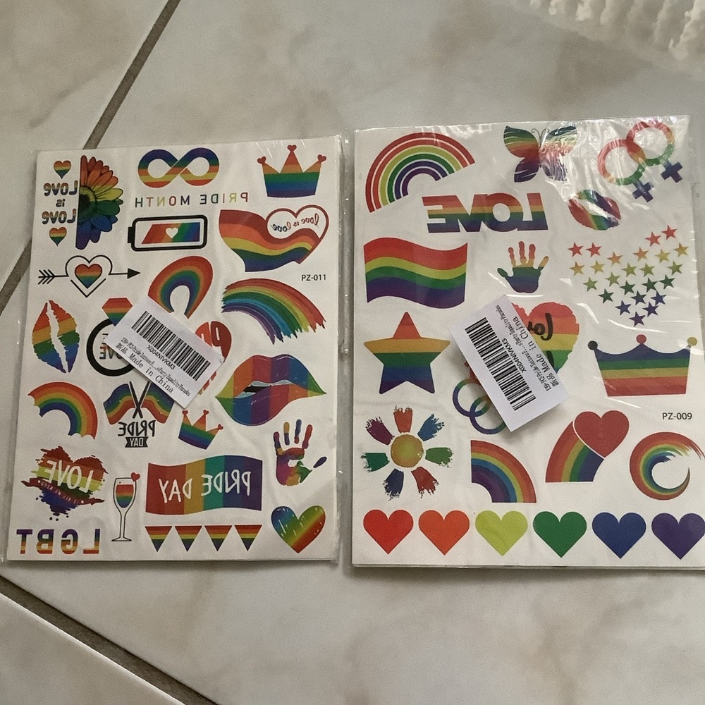 2 packages of pride tattoos and package of 60      Lot of 3